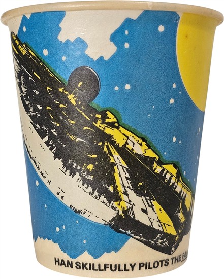 Han skillfully pilots the Falcon around the huge Imperial destroyer.