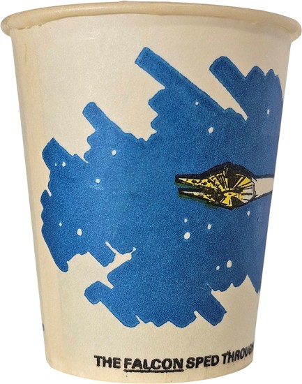 The Falcon speeds through the crevice, pursued by a titanic space slug.