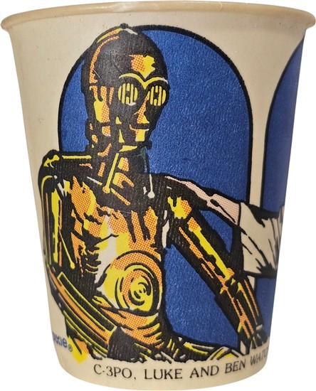 C-3PO, Luke and Ben watch and listen to Princess Leia's message.