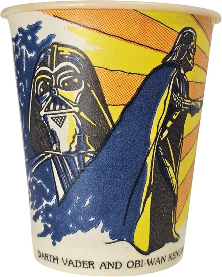 Darth Vader and Obi-Wan Kenobi duel to the death with their lightsabers.